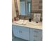 Bathroom vanity showcasing a modern sink, white cabinetry, and stylish decor, creating an elegant and functional space at 5667 Sw 92Nd Pl, Ocala, FL 34476