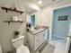 Well-lit bathroom with granite countertops, providing a clean and functional space at 5667 Sw 92Nd Pl, Ocala, FL 34476