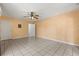 Living Room with tile floor, light color walls and two doors at 6157 Ne 25Th Ave, Ocala, FL 34479