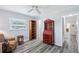 Versatile home office space with hardwood floors, ample storage, and natural light at 6448 Sw 111Th Pl, Ocala, FL 34476