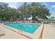 Sparkling community pool with clear blue water and surrounding lounge area for relaxation at 6448 Sw 111Th Pl, Ocala, FL 34476