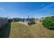 The backyard features an above-ground pool, fenced yard, well-maintained lawn, and mature landscaping at 7 Larch Dr, Ocala, FL 34480