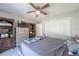 Spacious bedroom with ample storage, a ceiling fan, and carpeted floors, offering a comfortable living space at 7 Larch Dr, Ocala, FL 34480