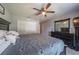 Bedroom featuring ceiling fan and double door closet at 7 Larch Dr, Ocala, FL 34480