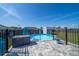 Fenced in above-ground pool with paver patio, shed, and landscaping at 7 Larch Dr, Ocala, FL 34480