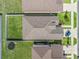 Aerial view of a house showcasing the roof, fenced backyard, and surrounding neighborhood, highlighting location and amenities at 7206 Sw 60Th Ln, Ocala, FL 34474