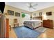 Comfortable bedroom featuring hardwood floors, natural light, and a ceiling fan at 8785 Sw 93Rd Ln # C, Ocala, FL 34481