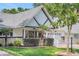 Charming home boasts a well-maintained lawn, attractive landscaping, and a welcoming two-car attached garage at 8785 Sw 93Rd Ln # C, Ocala, FL 34481