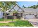 Charming home boasts a well-maintained lawn, attractive landscaping, and a welcoming two-car attached garage at 8785 Sw 93Rd Ln # C, Ocala, FL 34481