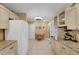 Bright kitchen with granite countertops, white cabinetry, stainless appliances and an eat-in area at 8785 Sw 93Rd Ln # C, Ocala, FL 34481