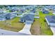 Aerial view of the home showcasing its well-maintained lawn and community at 8943 Se 41St Court Rd, Ocala, FL 34480