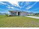 Charming home with a well-kept lawn and an attached two-car garage in a quiet neighborhood at 8943 Se 41St Court Rd, Ocala, FL 34480
