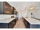 Kitchen features stainless appliances, a large island, and dark wood cabinetry at 8943 Se 41St Court Rd, Ocala, FL 34480