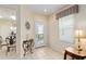 Entryway with tile flooring, decorative table, and window with natural light at 9408 Se 132Nd Loop, Summerfield, FL 34491