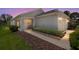 Charming one-story home with manicured lawn, neutral siding, and attached two-car garage at 9408 Se 132Nd Loop, Summerfield, FL 34491