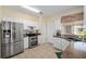 Efficient kitchen boasts stainless steel appliances, tile floors, double oven and lots of cabinet space at 9408 Se 132Nd Loop, Summerfield, FL 34491