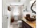 Elegant bathroom features a glass bowl sink atop a granite countertop and a walk-in shower at 9750 Sw 97Th Pl, Ocala, FL 34481