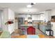 Modern kitchen featuring stainless steel appliances, granite countertops, and ample cabinet space at 9750 Sw 97Th Pl, Ocala, FL 34481