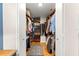 Spacious walk-in closet with custom shelving and storage for optimal organization at 9750 Sw 97Th Pl, Ocala, FL 34481