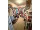 Walk-in closet provides ample storage with shelving and hanging space, catering to organizational needs at 1001 Ne 22Nd Ave, Ocala, FL 34470