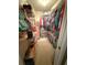 Walk-in closet with organized shelving and hanging racks, maximizing storage capacity for clothing and accessories at 1001 Ne 22Nd Ave, Ocala, FL 34470