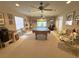 Entertaining game room with a pool table, ceiling fans, recessed lighting and seating at 1001 Ne 22Nd Ave, Ocala, FL 34470