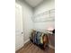 Walk-in closet with ample shelving and hanging space for organized storage at 10208 Se 170 Pl, Summerfield, FL 34491
