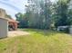 Large backyard and lush green space at 14 Dogwood Drive Radl, Ocala, FL 34472
