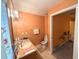 Functional bathroom featuring a vanity and toilet; doorway into another room at 14 Dogwood Drive Radl, Ocala, FL 34472
