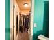 Walk-in closet with hanging clothes and storage shelving at 14 Dogwood Drive Radl, Ocala, FL 34472