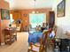 Dining area featuring a large table with seating and a view of the backyard at 14 Dogwood Drive Radl, Ocala, FL 34472