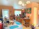 Spacious living room connected to the dining area at 14 Dogwood Drive Radl, Ocala, FL 34472