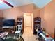 Living room with tile floors, entertainment center, and access to hallway at 14 Dogwood Drive Radl, Ocala, FL 34472