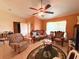Inviting living room with tile flooring, ceiling fan, and comfortable seating area at 14 Dogwood Drive Radl, Ocala, FL 34472