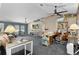 Open-concept living room with an office area, lots of space, and natural light at 14330 Sw 79Th Ter, Ocala, FL 34473
