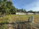 View of a newly built home with a spacious lot and lush green trees at the back of the property at 14415 Sw 21St Pl, Ocala, FL 34481