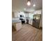 New kitchen featuring granite countertops and stainless steel appliances at 14415 Sw 21St Pl, Ocala, FL 34481