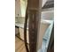 Stainless steel refrigerator with freezer temperature control and ice maker settings at 14415 Sw 21St Pl, Ocala, FL 34481