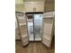 Spacious, open stainless steel refrigerator with freezer and ice maker at 14415 Sw 21St Pl, Ocala, FL 34481