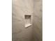 Shower nook detail of a fully remodeled shower at 14415 Sw 21St Pl, Ocala, FL 34481