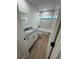 Bathroom with new vanity, tiled shower and tub at 14425 Sw 21St Pl, Ocala, FL 34481