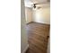 Empty bedroom with modern ceiling fan and wood-look flooring, ready for personal touches at 14425 Sw 21St Pl, Ocala, FL 34481