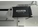LiftMaster garage door opener powered by myQ is centrally mounted overhead at 14425 Sw 21St Pl, Ocala, FL 34481