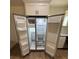 Stainless steel refrigerator with an ice maker and adjustable shelves provides ample storage at 14425 Sw 21St Pl, Ocala, FL 34481