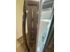 Close up of a Stainless Steel Refrigerator with an ice maker and internal control panel at 14425 Sw 21St Pl, Ocala, FL 34481