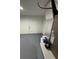 Utility room featuring white walls, a door to the exterior, and an HVAC unit at 14425 Sw 21St Pl, Ocala, FL 34481