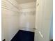 Walk-in closet with wire shelving, providing organized storage space at 17574 Se 95Th Ct, Summerfield, FL 34491