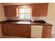 Clean kitchen with wooden cabinetry and a bright atmosphere at 17574 Se 95Th Ct, Summerfield, FL 34491