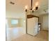 Open-concept living area featuring tiled flooring and natural light at 17574 Se 95Th Ct, Summerfield, FL 34491