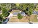 Cozy home with well-maintained landscaping, a modern roof, and a long driveway nestled among mature trees at 1812 Se 38Th Ave, Ocala, FL 34471